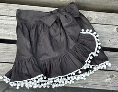 SEVILLE SKIRT COVER UP IN BLACK & WITH POMPONS